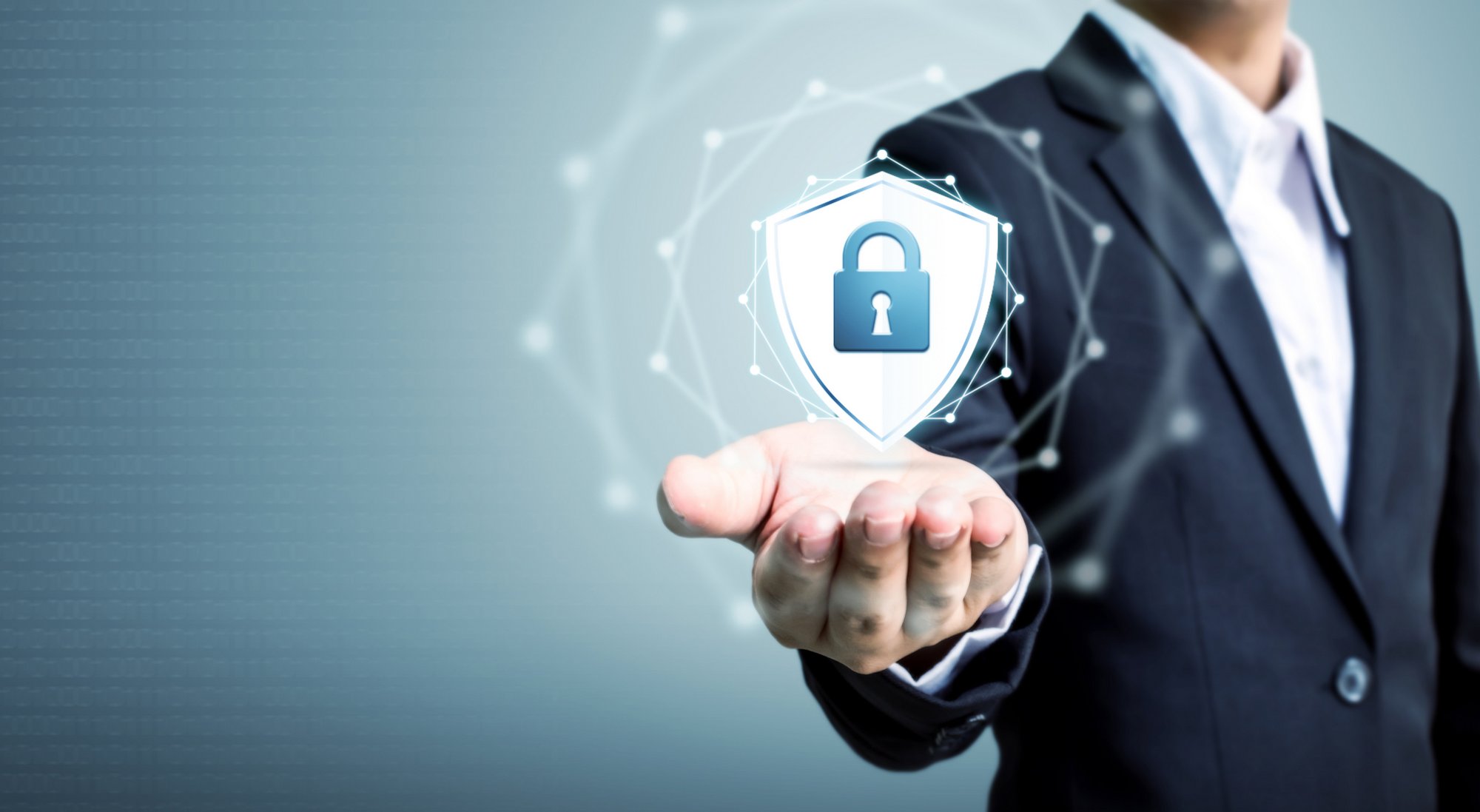 Protection network security computer and safe your data concept, Businessman holding shield protect icon